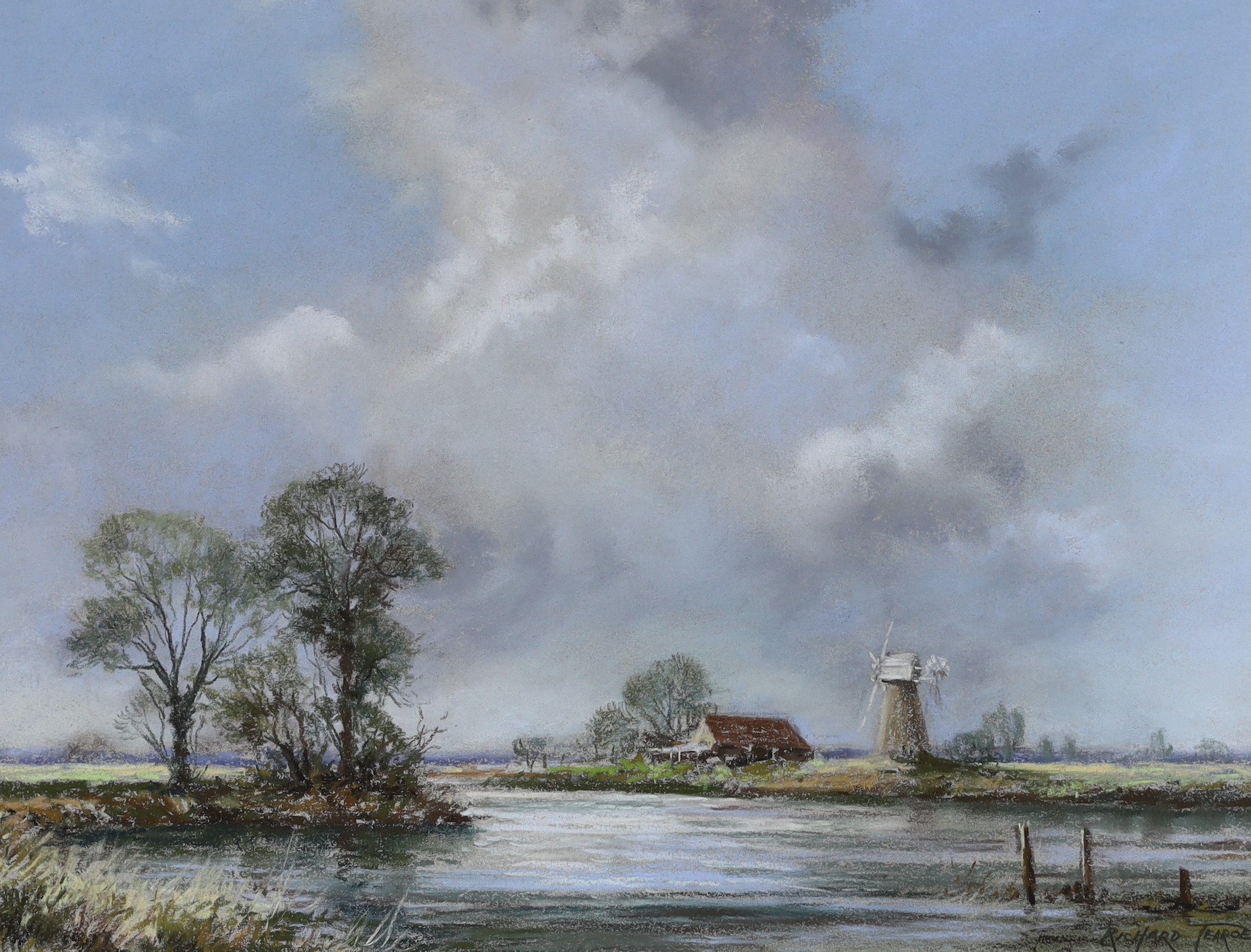 Richard Tearoe (20th C.), pair of pastels, 'Break in the clouds' and 'Windmill in a landscape', signed, 33 x 43cm